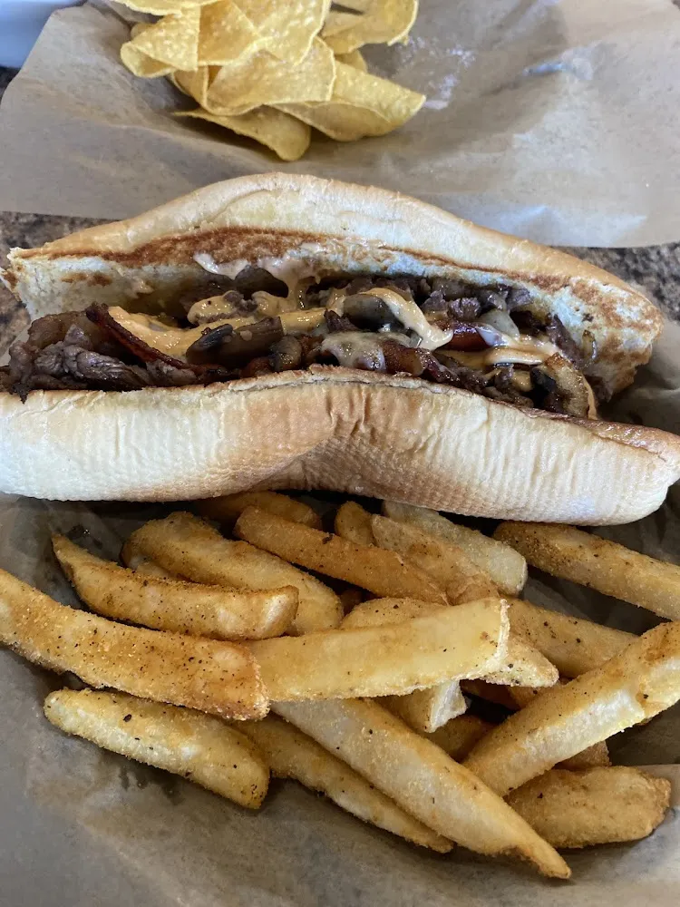 Ribeye Steak Sandwich and Fries